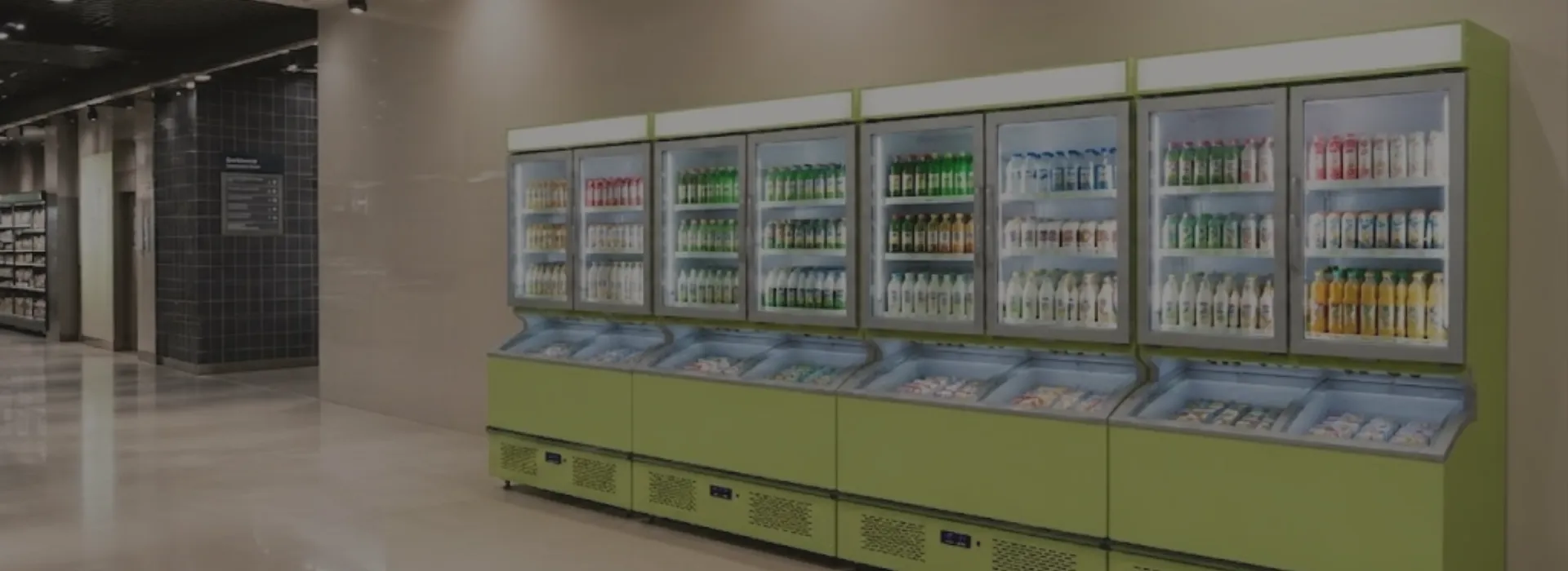 Commercial combi freezer cabinet installed in a retail store with dual temperature display sections
