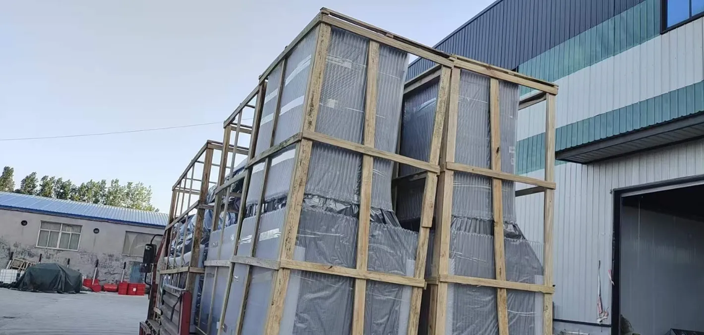 Commercial freezers secured in heavy-duty wooden frames on a truck, ready for safe long-distance shipping and delivery.