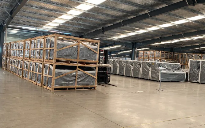 Refrigeration products wrapped and secured in wooden frames for shipment